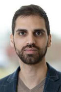 Der ehemalige Projekt-Mitarbeiter Navid Azarafroz Portraitfoto einer männliuchen Person.